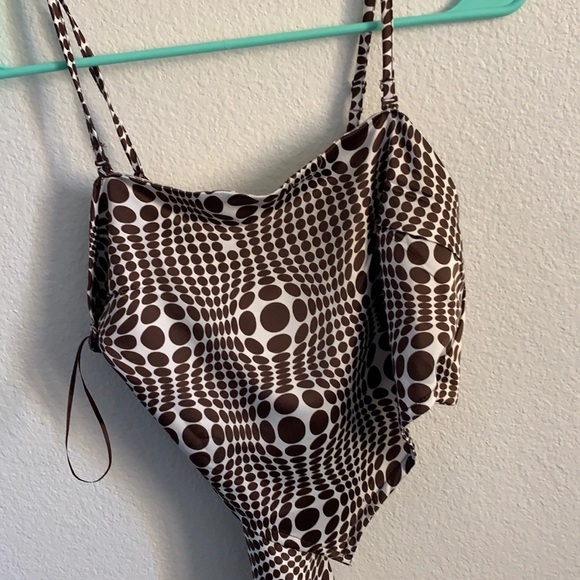 Perfect going out Silk bandana top with straps. Never worn and ties in the back. - Picture 1 of 2